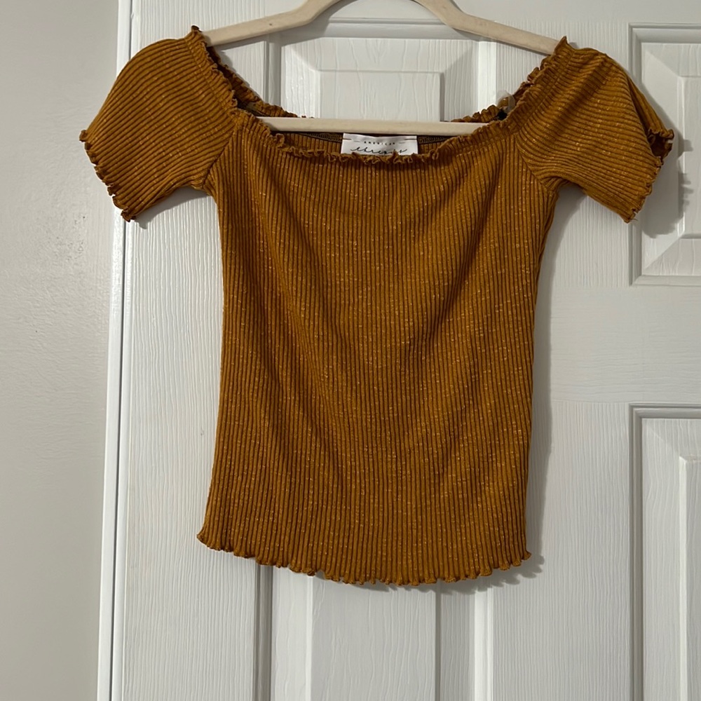 Yellow off shoulder top.